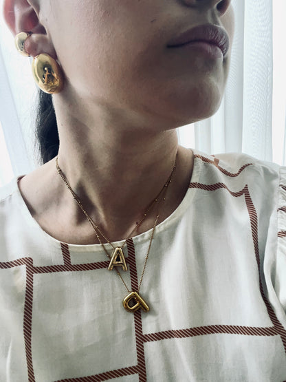 Cadena de letra en acero + Topos de balín